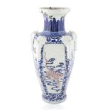 A CHINESE PORCELAIN WHITE AND QING BLUE VASE, EARLY 19TH CENTURY
