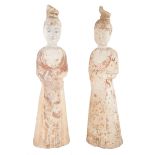 A PAIR OF CHINESE FEMALE ATTENDANTS, TANG DYNASTY (618-907)