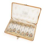 A SET OF TWELVE RUSSIAN SILVER, ENAMEL AND CLOISONNE DEMITASSE SPOONS, KURLIUKOV RETAILER'S BOX, 18