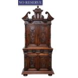 A FRENCH STAINED-OAK RENAISSANCE-REVIVAL FIGURAL CARVED STEP-BACK WALL CABINET, LATE 18TH CENTURY