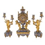 A FRENCH ORMOLU AND CHAMPLEVE ENAMELLED THREE-PIECE GARNITURE, 19TH CENTURY