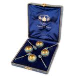 A SET OF FOUR RUSSIAN SILVER, ENAMEL AND CLOISONNE SALONIKA'S WITH SPOON'S, ALAVELLERUSSIE RETAILER