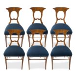 A SET OF SIX BIEDERMEIER WALNUT SIDE CHAIRS, SECOND QUARTER OF 19TH CENTURY