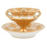 LATE 19TH-EARLY 20TH CENTURY CONTINENTAL GILT AND PORCELAIN CHALICE AND SAUCER