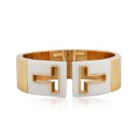 A CONTEMPORARY TIFFANY & CO. T 18K GOLD CUTOUT CUFF BANGLE BRACELET