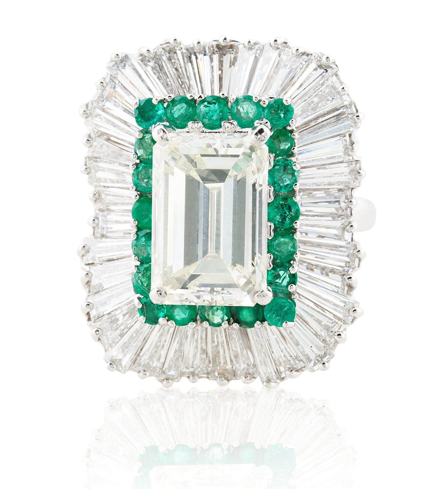 A 5.03 CT EMERALD CUT DIAMOND RING IN A BALLERINA SETTING