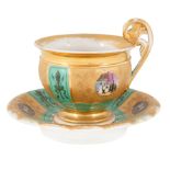 19TH CENTURY GILT PORCELAIN TEA CUP AND SAUCER