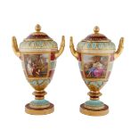 FIRST HALF 20TH CENTURY PAIR OF ACKERMANN & FRITZE PORCELAIN COVERED URNS