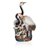 LARGE PORCELAIN FIGURAL GROUP OF A 'CRANE FAMILY'