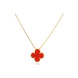 A VAN CLEEF & ARPELS 18K GOLD AND CARNELIAN "ALHAMBRA" PENDANT