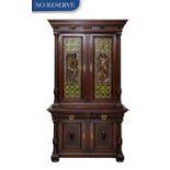 FRENCH RENAISSANCE-REVIVAL STAINED-OAK COLORED LEAD-GLASS AND BRONZE-INSET STEPBACK BOOKCASE CABINET