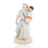 SOVIET PORCELAIN FIGURE OF A SPANISH CIVIL WAR SOLDIER KISSING HIS SON