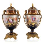 20TH CENTURY ROYAL-VIENNA STYLE PORCELAIN URNS