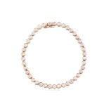 TIFFANY & CO 18KT GOLD AND DIAMOND TENNIS BRACELET