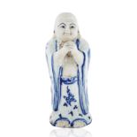 CHINESE PORCELAIN STATUETTE OF BUDAI