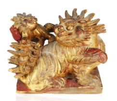 LATE QING DYNASTY CARVED WOOD FOO DOG WITH CUB
