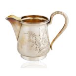 A CIRCA 1890 FABERGE SILVER CREAMER, MOSCOW