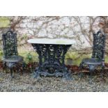 PAIR OF HEAVY CAST IRON GARDEN CHAIRS