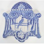 PAIR OF BLUE AND WHITE ARMORIAL PLACQUES