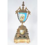 FRENCH PORCELAIN AND GILT METAL CLOCK GARNITURE