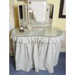 UPHOLSTERED KIDNEY SHAPED DRESSING TABLE