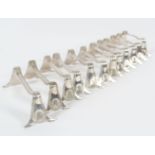 SET OF 12 SILVER PLATED KNIFE RESTS