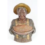 TERRACOTTA FIGURE HOLDING A CASSEROLE DISH