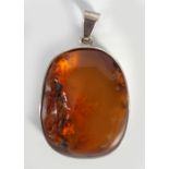 SILVER MOUNTED AMBER PENDANT