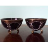 PAIR OF BRASS MOUNTED COCONUT BOWLS
