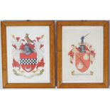 PAIR OF EARLY 19TH-CENTURY ARMORIAL CRESTS