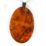 AMBER PENDANT WITH INCLUSIONS