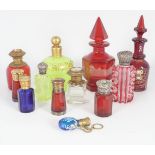 COLLECTION OF 12 GLASS PERFUME BOTTLES