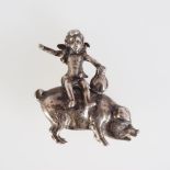 STERLING SILVER CHERUB MOUNTED ON A PIG