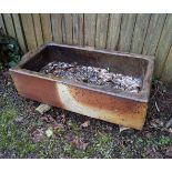 TWO ANTIQUE TERRACOTTA TROUGHS