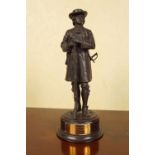 A BRONZE TROPHY PILGRIM FIGURE