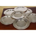 GROUP OF SILVER-PLATED SOUS PLATS