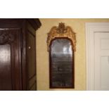 GEORGE I WALNUT AND PARCEL GILT PIER MIRROR