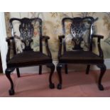 PAIR OF DUBLIN CHIPPENDALE CARVERS