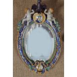 19TH-CENTURY FAIENCE ARMORIAL PIER MIRROR