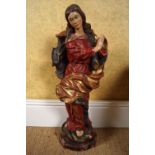 CARVED GILTWOOD AND POLYCHROME STATUE