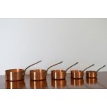 SET OF FIVE COPPER SAUCEPANS