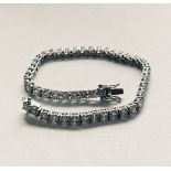 18CT WHITE GOLD DIAMOND TENNIS BRACELET