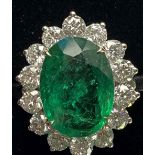 18CT COLUMBIAN EMERALD AND DIAMOND CLUSTER RING