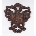 CARVED ARMORIAL WOOD PANEL