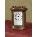 MINIATURE BRASS CARRIAGE CLOCK