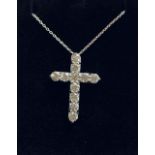 18CT WHITE GOLD AND DIAMOND PENDANT CROSS