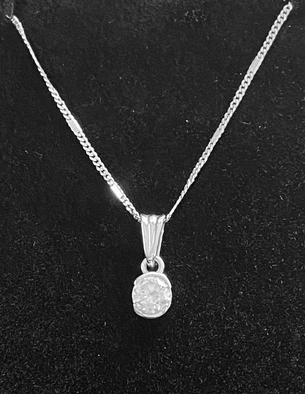 18CT WHITE GOLD BEZEL SET DIAMOND PENDANT