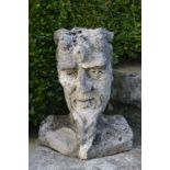 CARVED STONE HEAD