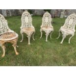 LOT OF 4 CAMEO BACK CAST IRON CHAIRS