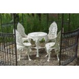CAST IRON PATIO TABLE AND CHAIRS